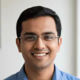 Portrait of Neil Kapoor - Bulma AI assistant for Australian mortgage brokers focused on scenario planning, credit assessment, policy matching, and lender selection